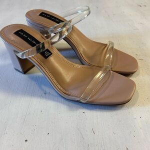 Nude heels with clear straps